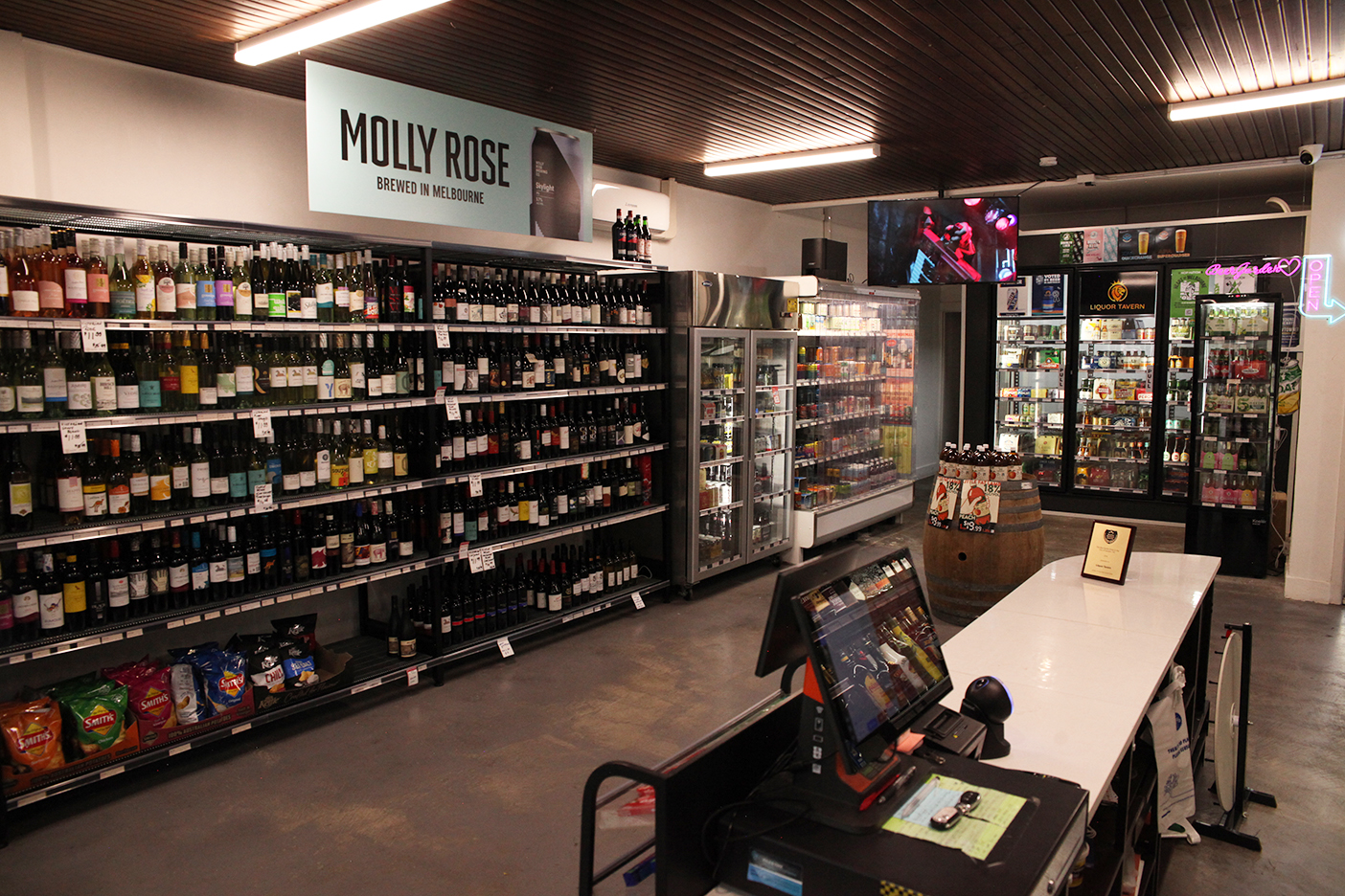 Liquor Tavern beer garden at dusk with warm lighting